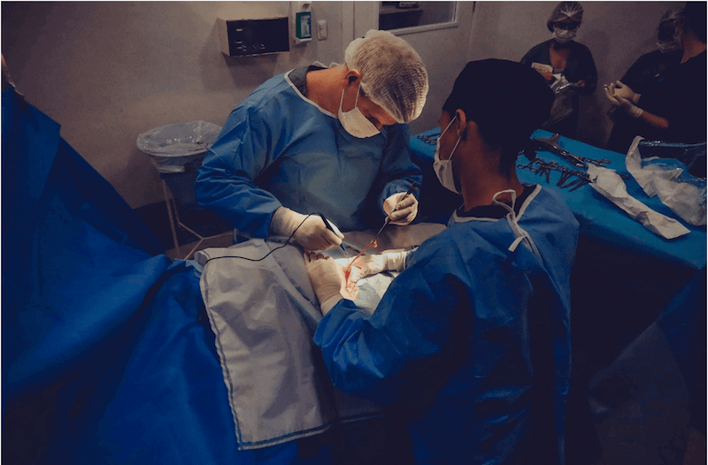 An operating room with medical staff