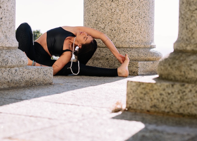 focused woman practicing yoga