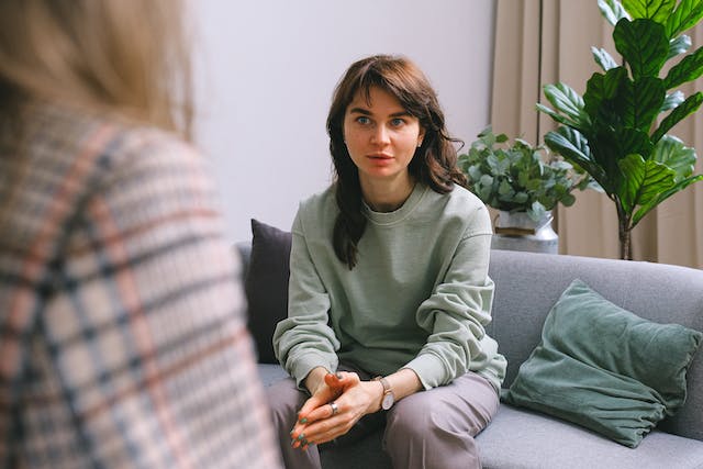 Woman consulting with a therapist before plastic surgery