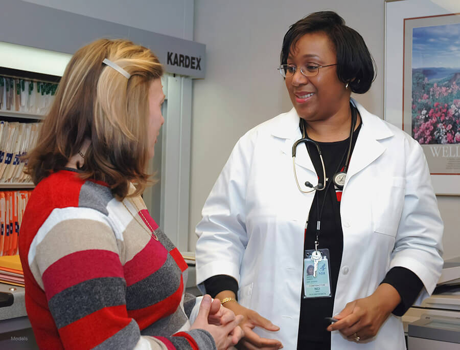 A patient and a doctor talking