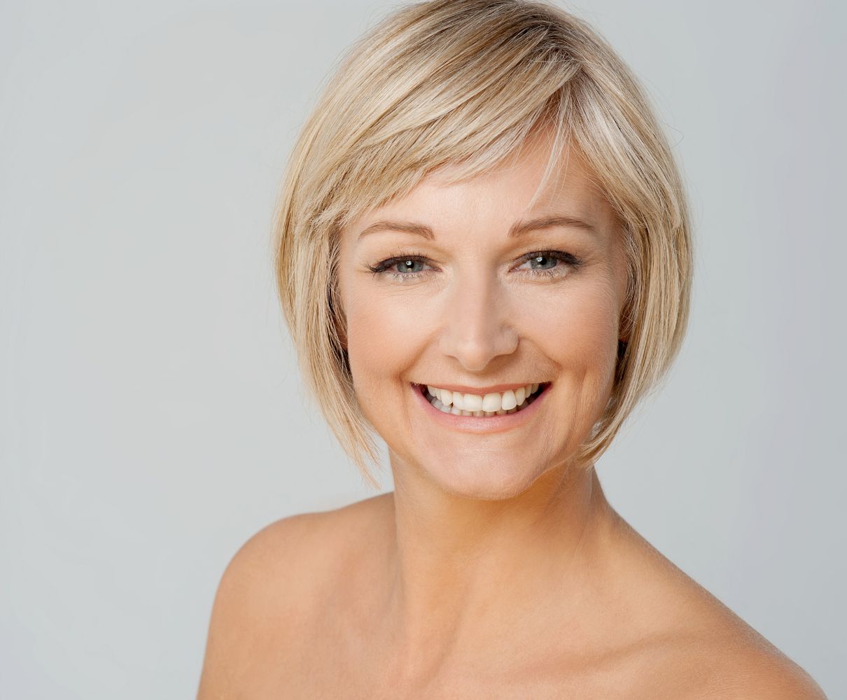 Woman with short blond hair